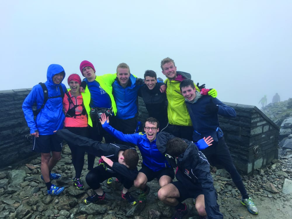 The intrepid runners celebrate reaching Snowdon’s summit // ICXCAC