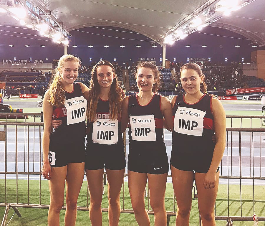 The women’s 4x200m team still smiling after a tough relay heat. // ICXCAC