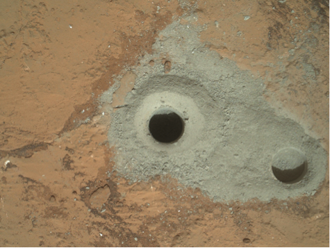 Curiosity’s first drill hole on 8 February 2013 in a rock named “John Klein”.