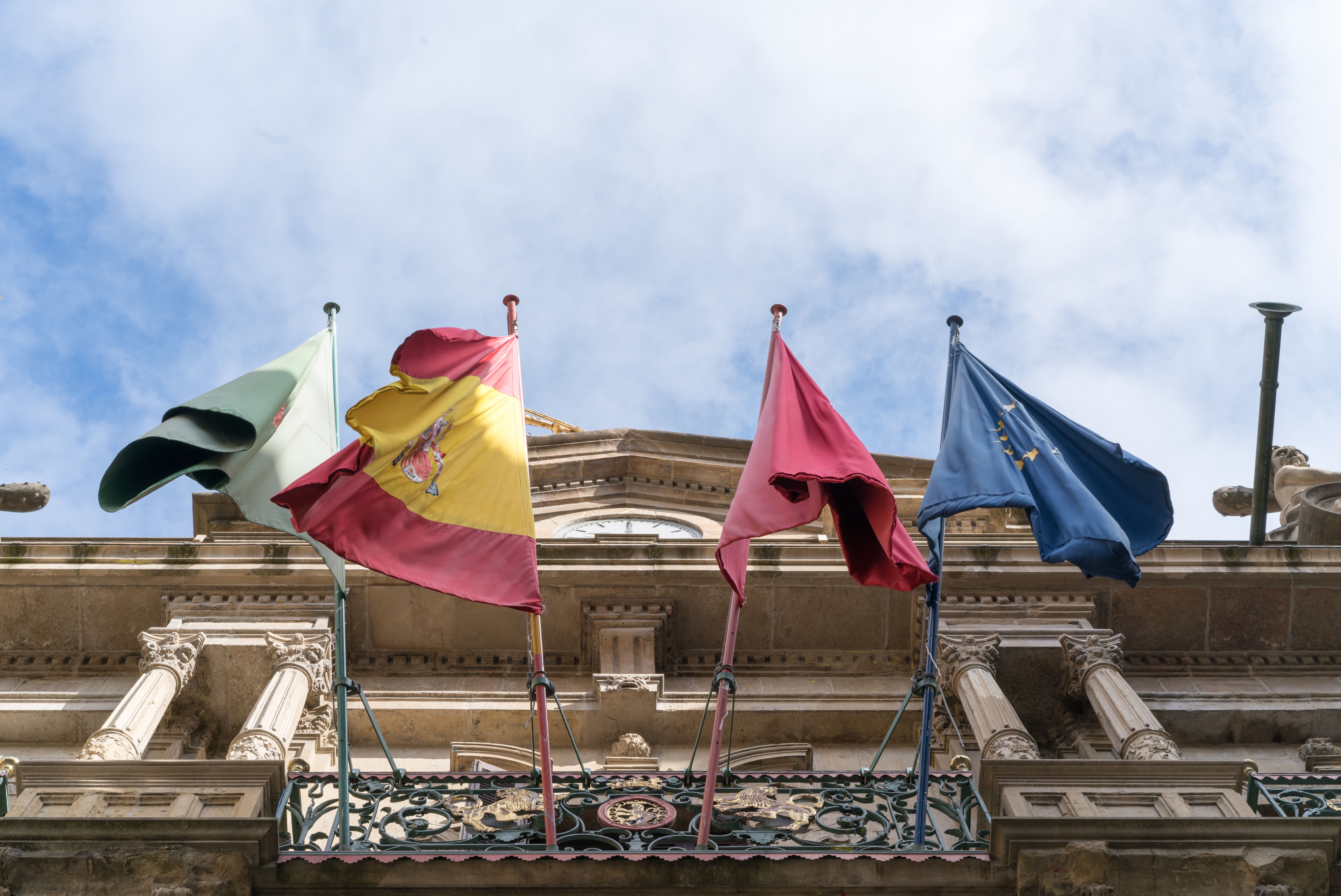 A photograph of four flags of european countries